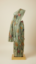 Sage green cotton saree with contemporary floral print